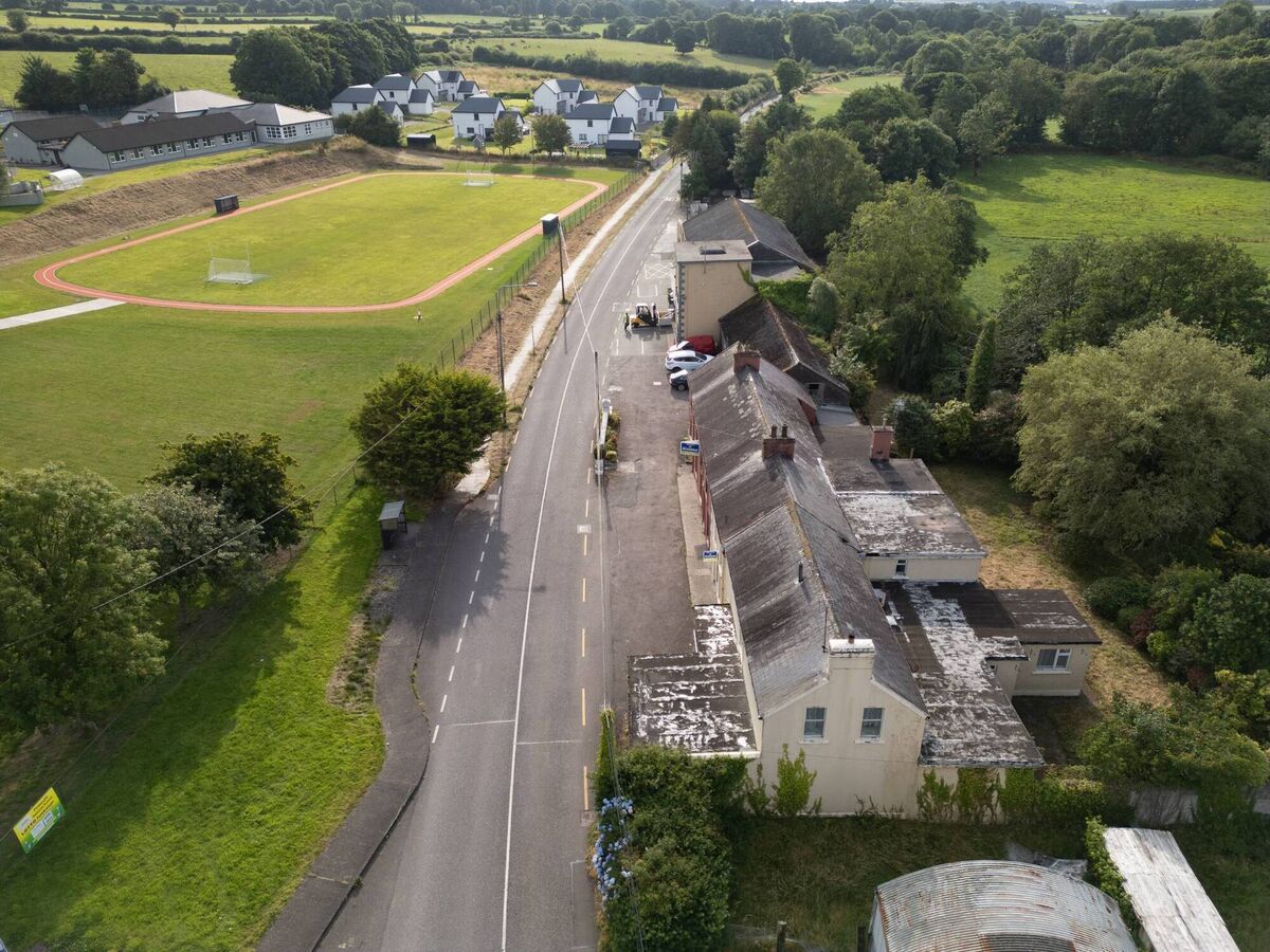 Make the running: national school, running track and Peg's shop are next door