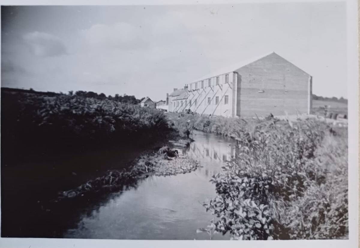 As you sow, so shall you reap?  Buildings are by the Shournagh river