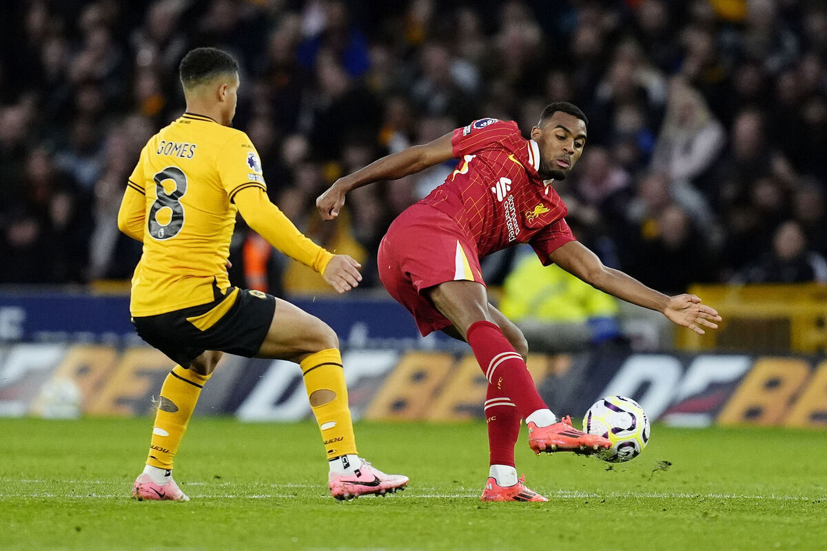 Wolverhampton Wanderers' Joao Gomes (left) and Liverpool's Ryan Gravenberch battle for the ball. Pic: Nick Potts/PA Wire.