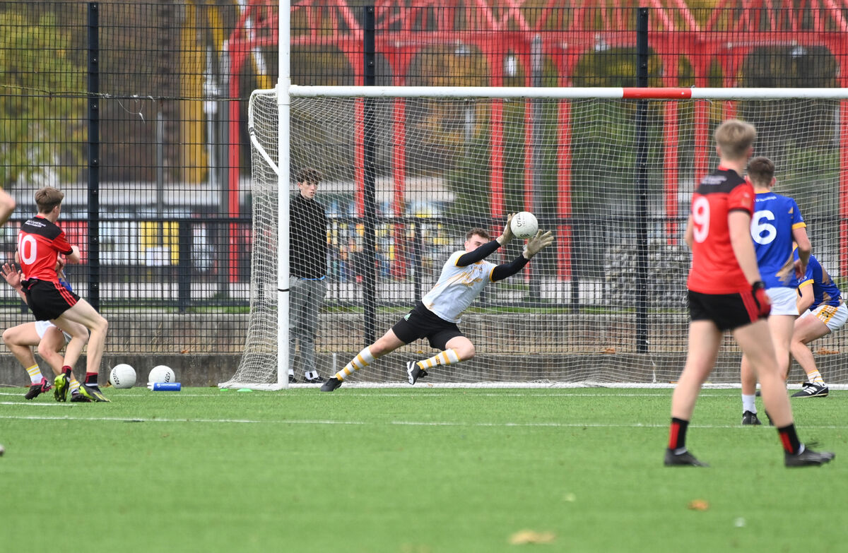  Goalkeeper Billy Curtin makes a fine save for Hamilton High School. 