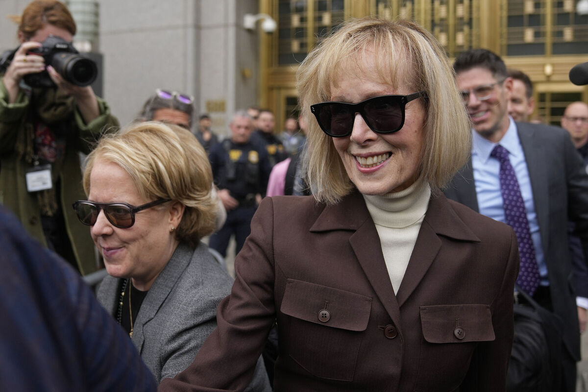 E. Jean Carroll, right, walks out of Manhattan federal court, May 9, 2023, in New York. Picture: AP Photo/Seth Wenig, File
