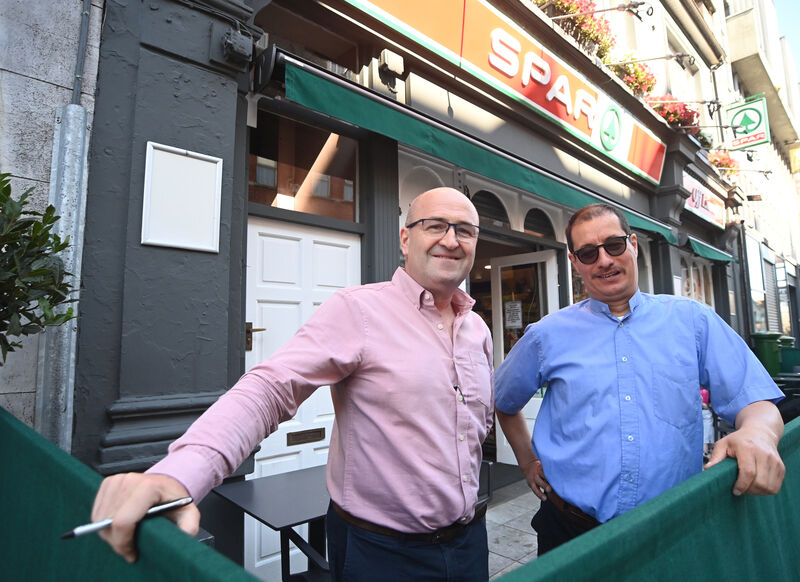 Proprietor Willie O'Brien and employee George Palcu outside the Spar on MacCurtain Street. Mr O'Brien says: 'When it comes to criminal law in this country there is an outdated revolving door system that doles out retribution with no restitution or rehabilitation.' Picture: Larry Cummins Proprietor Willie O'Brien and employee George Palcu outside the Spar on MacCurtain Street. Mr O'Brien says: 'When it comes to criminal law in this country there is an outdated revolving door system that doles out retribution with no restitution or rehabilitation.' Picture: Larry Cummins