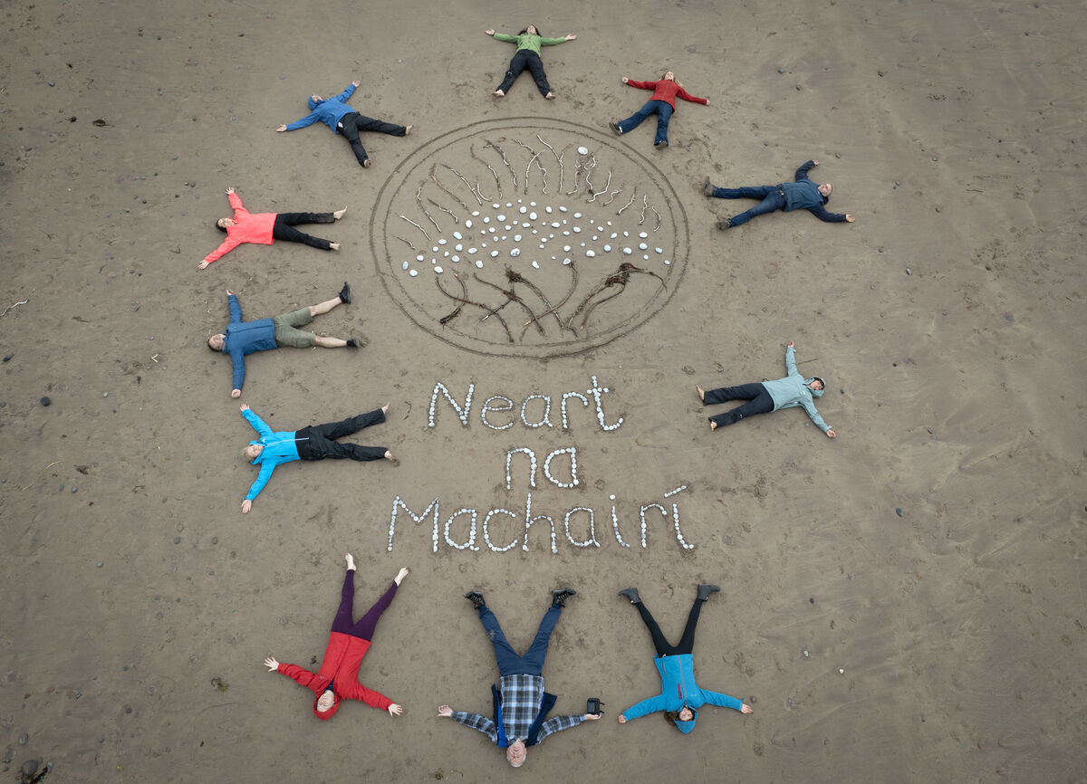  Members of the Maharees Conservation Association help with the sand art work on Brandon Bay to mark World Sand Dune Day last June. Silke Michels, Zoë Ui Fhaolain Green and Emer Fallon, all from Kerry, created a sand art collage to raise awareness about the significance of sand dunes as coastal erosion threatens coastal communities worldwide. Photo: Domnick Walsh © Eye Focus LTD