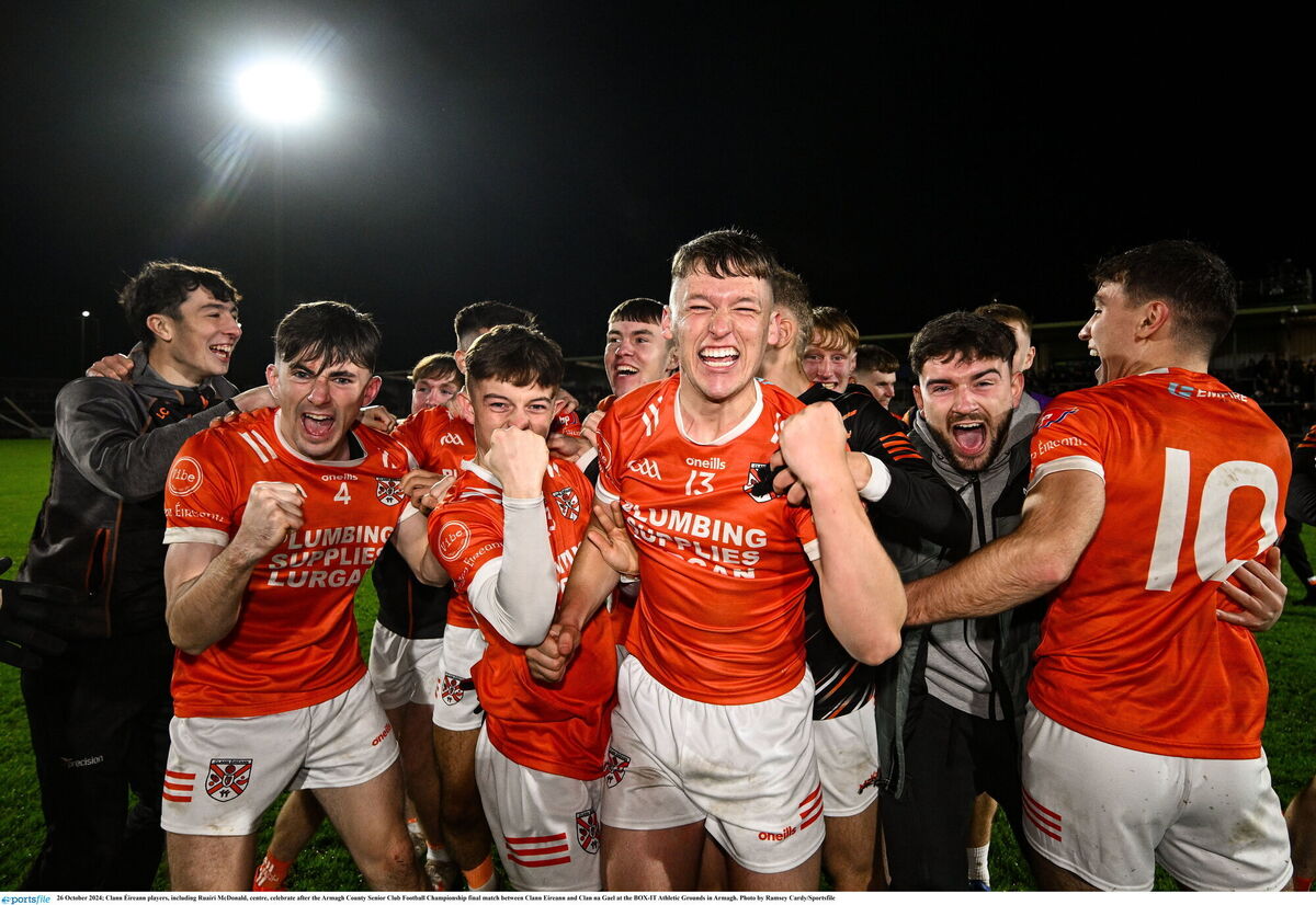 Clann Éireann players, including Ruairí McDonald, centre, celebrate after the Armagh County Senior Club Football Championship final match between Clann Eireann and Clan na Gael at the BOX-IT Athletic Grounds in Armagh. Photo by Ramsey Cardy/Sportsfile