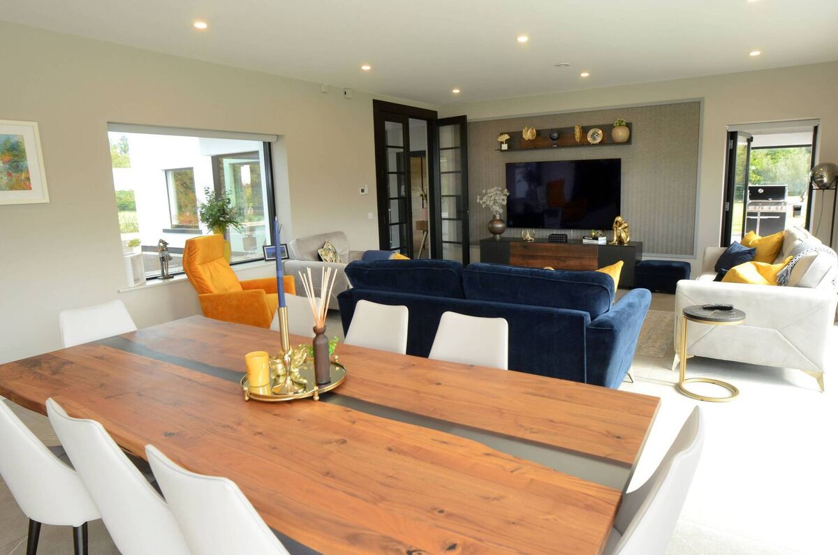 Pops of colour enliven the open-plan living area. Pops of colour enliven the open-plan living area.