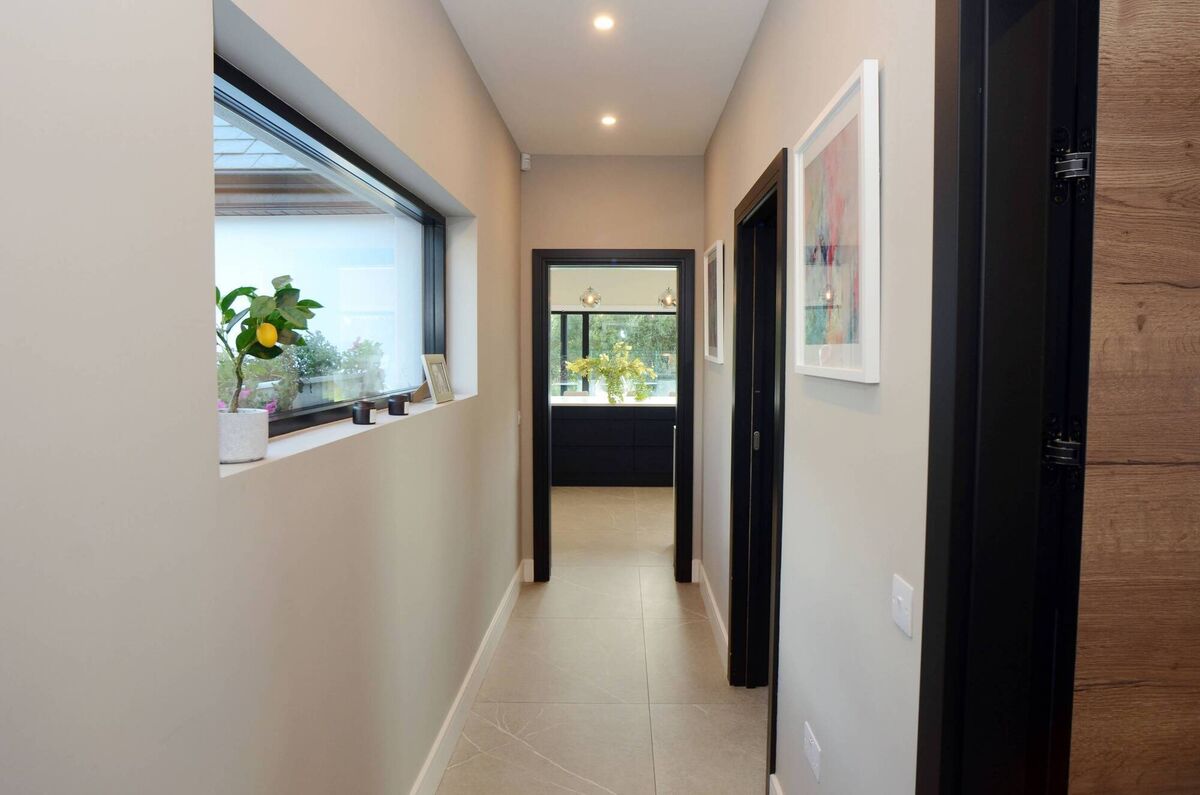 The bright corridor which leads to the the kitchen area. The bright corridor which leads to the the kitchen area.