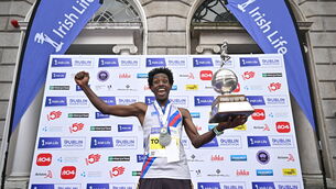 <p>HOME FAVOURITE: Hiko Tonosa celebrates with his Irish National Marathon Championship. Pic: by Sam Barnes/Sportsfile</p>