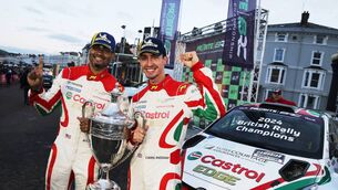 <p>BRITISH RALLY CHAMPIONS: Chris Ingram (right) and Alex Kihurani were crowned Probite British Rally Championship following their victory in the Visit Conwy Cambrian Rally, the final round of the series. Picture: British Rally Championship.</p>