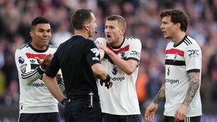 <p>RAGING REDS: Manchester United's Matthijs de Ligt (centre right) protests to referee David Coote (centre left) after he awards a penalty to West Ham United during the Premier League match at the London Stadium. Pic: John Walton/PA Wire.</p>