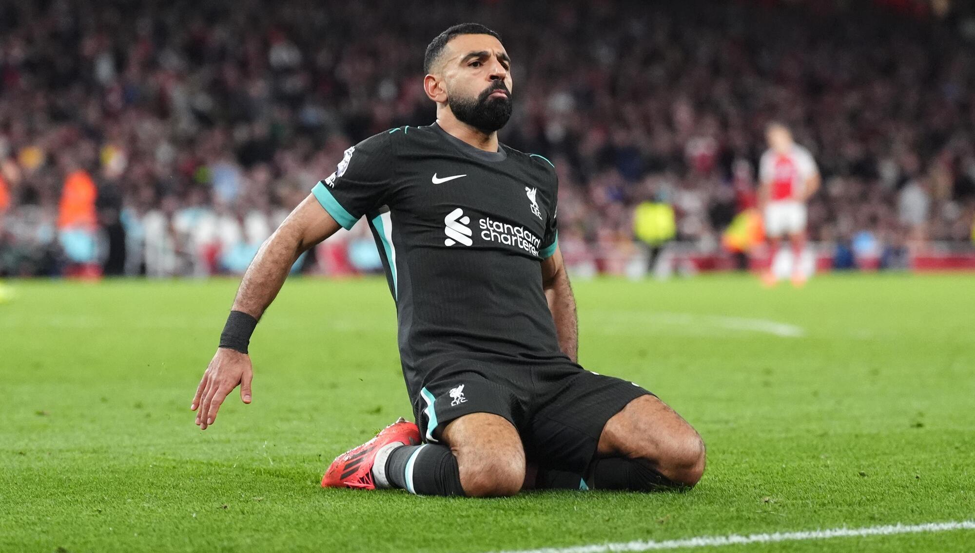 Salah helps Slot survive his top-five test as Arsenal have to settle for a point