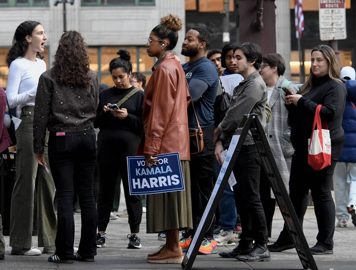 Philadelphia residents wait at city hall to cast their ballot on the last day of early voting on Tuesday. Picture: Matthew Hatcher / AFP via Getty Images