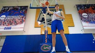<p>TALL ORDER: Olivier Rioux, the 7 ft 9 NCAA college basketball player in Gainesville, Florida. Pic: John Raoux, AP</p>