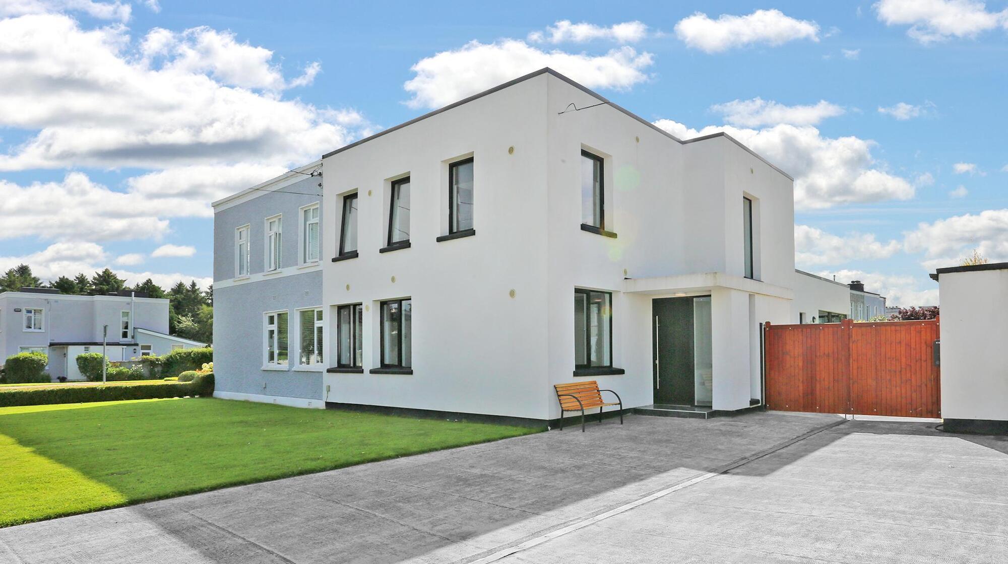 City to Country: Renovated 1950s Limerick flat-roof or large gardens and scenic views at €595k Kenmare home