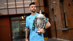 <p>Adam Foley holds the trophy prior to the big final on Sunday.</p>