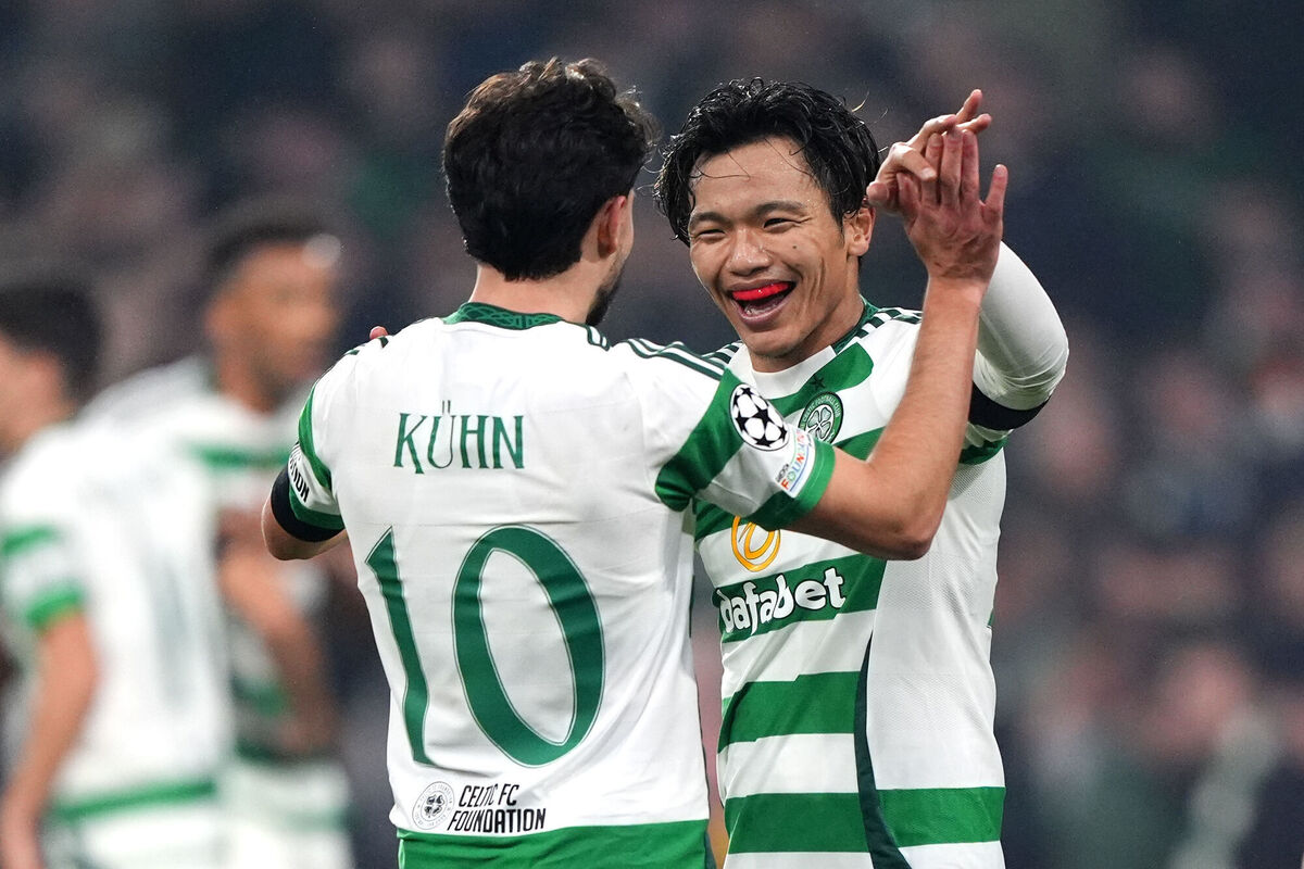 Reo Hatate (right) celebrates Celtic's third and final goal of the game as the Bhoys beat Leipzig 3-1 Reo Hatate (right) celebrates Celtic's third and final goal of the game as the Bhoys beat Leipzig 3-1