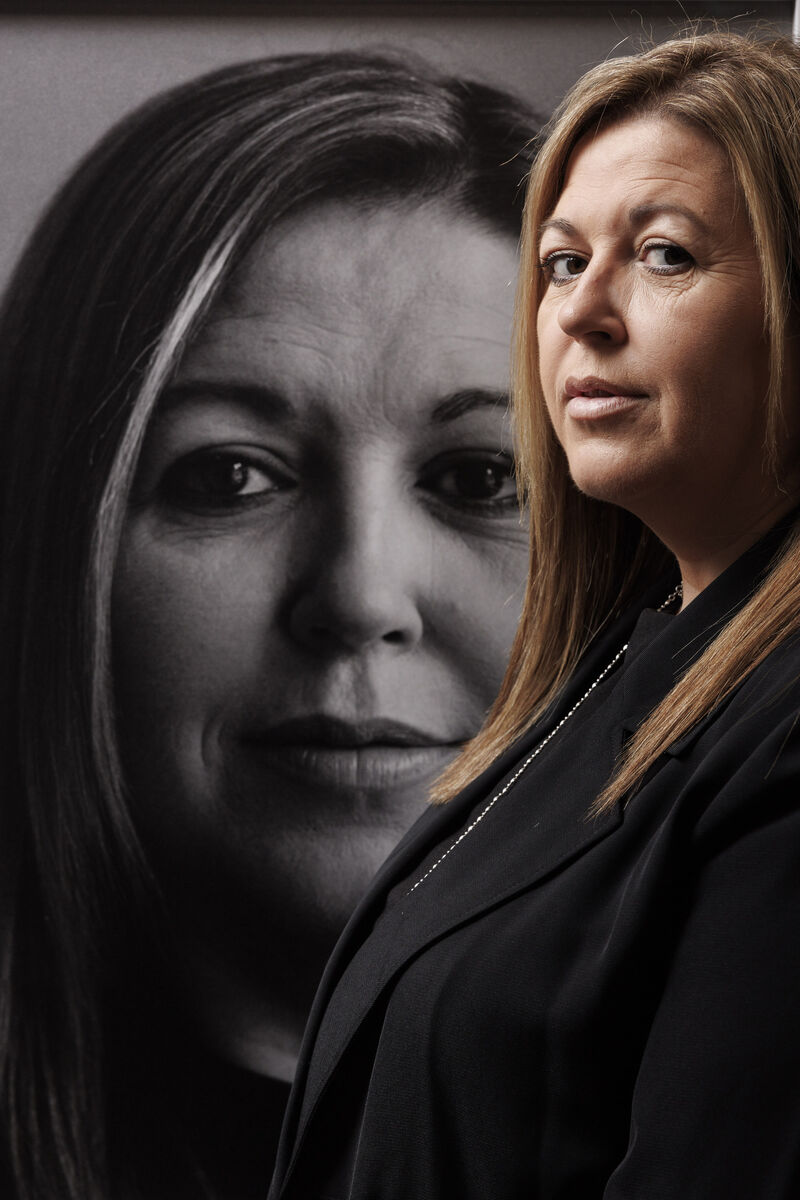 Maria Gibney pictured with her portrait at the Royal Hibernian Academy of Arts (RHA) on World Mental Health Day at the launch of ‘Hope In Focus’ - a portrait series commissioned by mental health charity Aware for Aware Mental Health Week 2024 from photographer Enda Bowe.