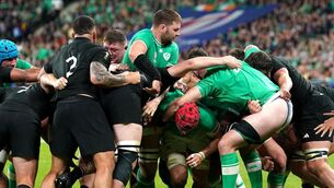 <p>Ireland's Josh van der Flier (centre) attempts to extricate himself from New Zealand pressure in the Rugby World Cup 2023 quarter final</p>