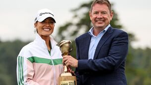 <p>Annabel Dimmock is presented with the KPMG Women's Irish Open trophy by KPMG Managing Partner Seamus Hand after her victory last September. Pic: Ben Brady/Inpho</p>