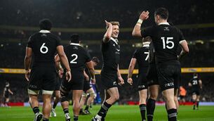 <p>Will Jordan of New Zealand, right, is congratulated by team-mate Damian McKenzie after scoring his side's first try during the Autumn Nations Series match between Ireland and New Zealand at the Aviva Stadium in Dublin. Photo by Seb Daly/Sportsfile</p>