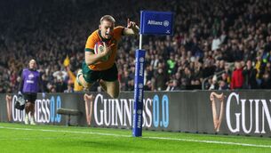 <p>AIR MAX: Australia’s Max Jorgensen scores the winning try at Twickenham to stun England. Pic:INPHO/Andrew Fosker</p>