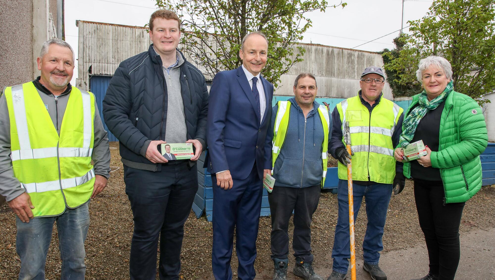 Tánaiste Micheál Martin, James O'Connor TD, and Cllr Sheila O'Callaghan met John Joe Harte, Ned Ramsell, and John Buckley who were putting up Christmas Lights in Carrigtwohill, Co Cork, while the Tánaiste was canvassing the East Cork constituency. Picture: David Creedon