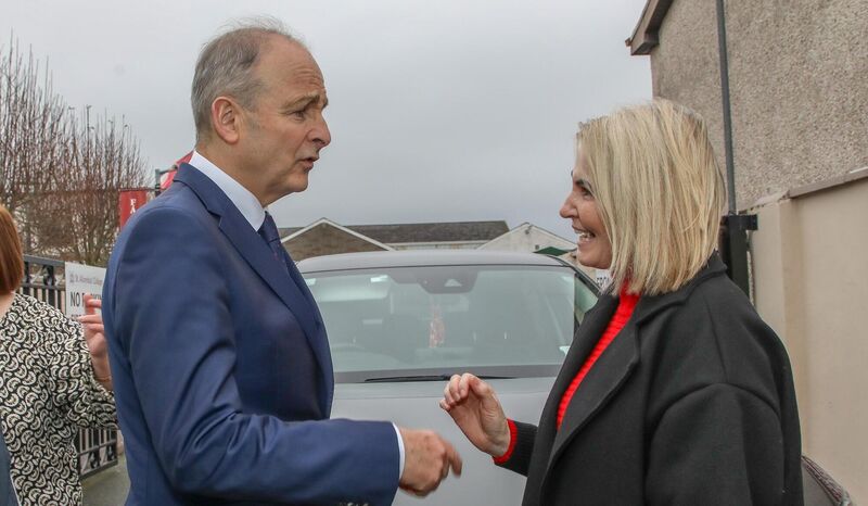 Tánaiste Micheál Martin speaks with nurse Olivia Barry in Carrigtwohill; she explained how she got covid at work in December 2020 and went on to develop long covid and  hasn’t been able to work as a result of it since August 2021. Picture: David Creedon