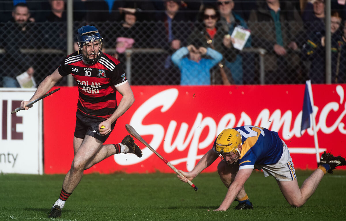 Cappataggle’s Niall Collins and Loughrea’s Shane O'Brien. Pic: ©INPHO/Evan Logan