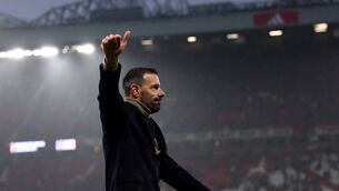 <p>Manchester United's interim head coach Ruud van Nistelrooy acknowledges fans at the end of the win over Leicester. Photo by DARREN STAPLES/AFP via Getty Images.</p>