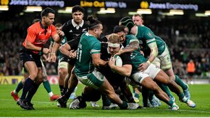 <p>Sam Cane of New Zealand is tackeld in the in goal area by James Lowe and Bundee Aki.</p>