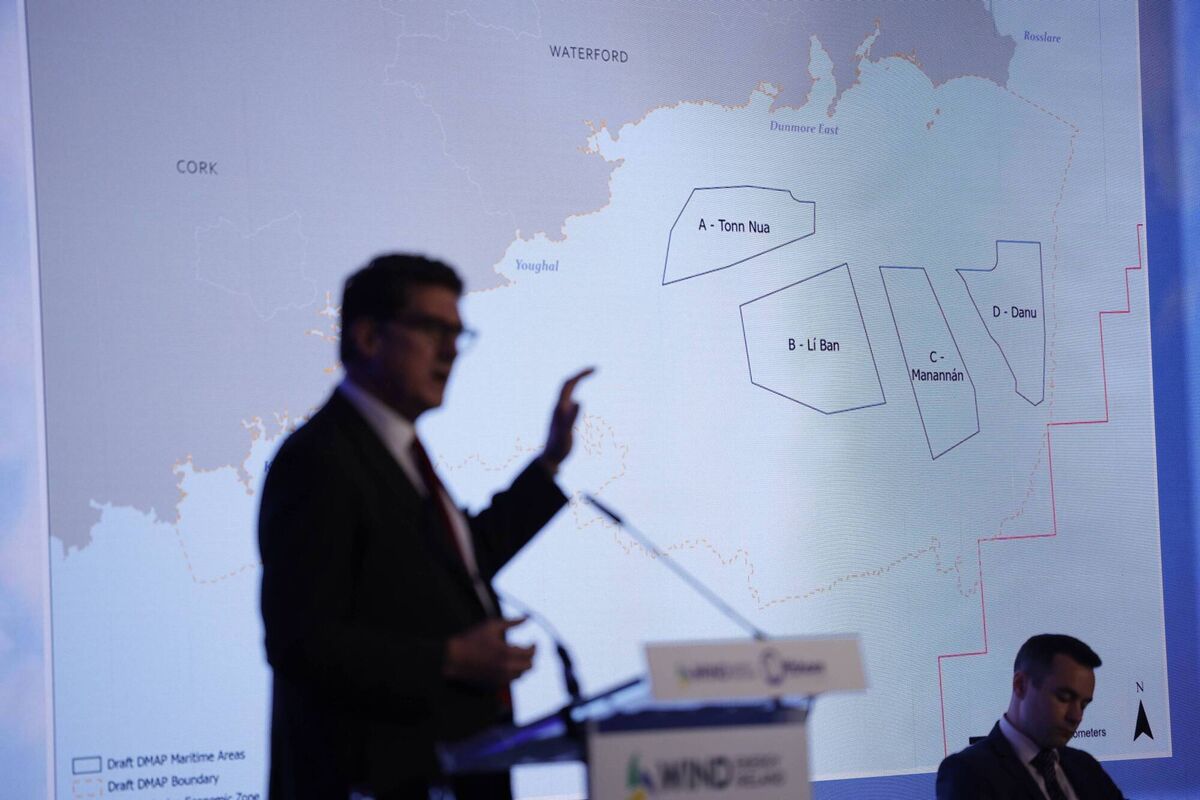 Minister for the Environment, Climate, Communications and Transport, Eamon Ryan, and Noel Cunniffe, CEO of Wind Energy Ireland, with the Designated Maritime Area Plan (DMAP) for offshore wind energy. Minister for the Environment, Climate, Communications and Transport, Eamon Ryan, and Noel Cunniffe, CEO of Wind Energy Ireland, with the Designated Maritime Area Plan (DMAP) for offshore wind energy.