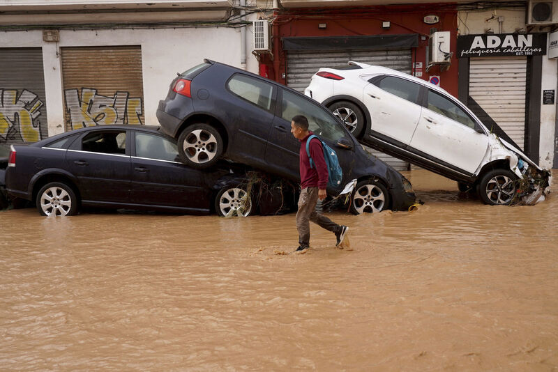 A man walks through flooded streets in Valencia, Spain, Wednesday, Oct. 30, 2024. Picture: AP Photo/Alberto Saiz