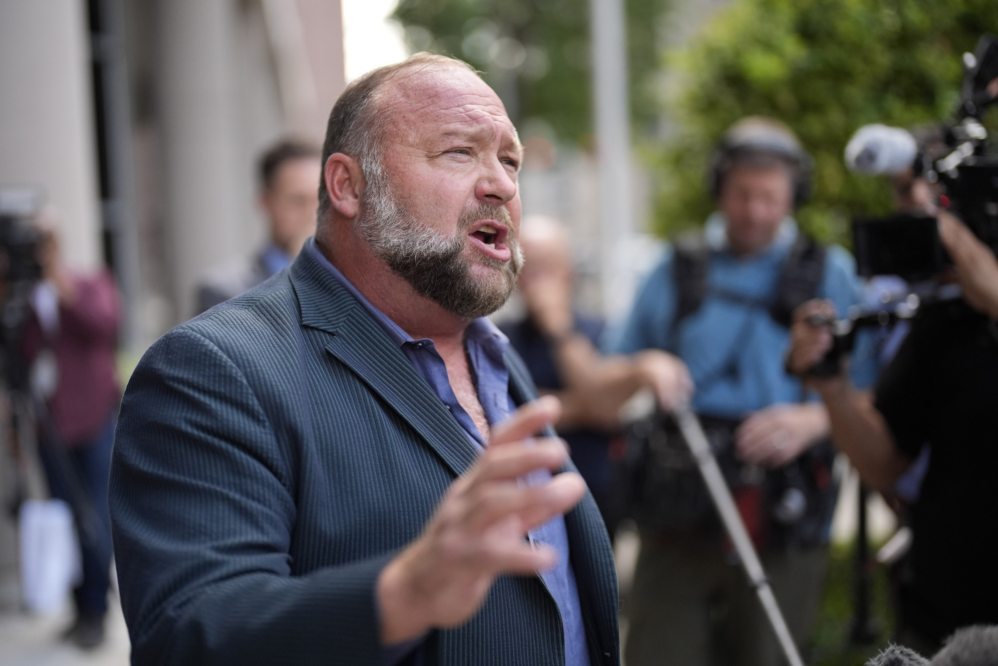 Conspiracy site Infowars ‘dead’ after satirical publication wins bankruptcy bid