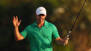 <p>Rory McIlroy acknowledges the crowd on the 17th on day one of the DP World Tour Championship at Jumeirah Golf Estates in Dubai. Pic: Andrew Redington/Getty Images</p>