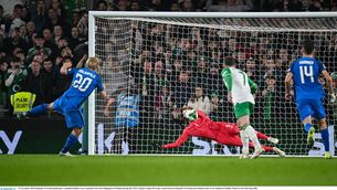 <p>Caoimhin Kelleher saves a penalty from Joel Pohjanpalo.</p>