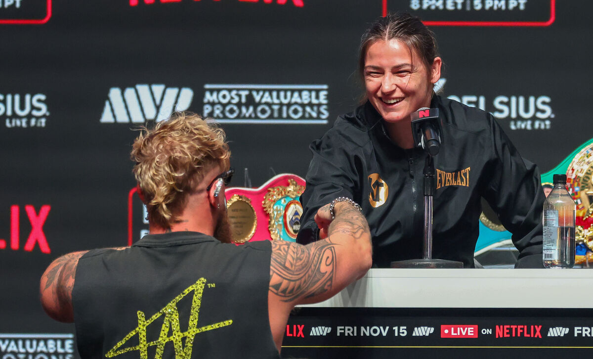 Jake Paul and Katie Taylor shake hands on a bet during the press conference. For Taylor, her money is on Tyson for the win. Picture: Ed Mulholland/Inpho
