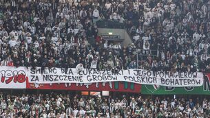 <p>MESSAGE: Legia fans present a banner aimed at Belarus president Aleksandr Lukashenko during last week's Conference League game against Dinamo Minsk in Warsaw. Pic: Foto Olimpik/NurPhoto</p>