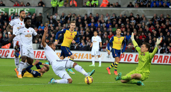 Late Swansea double sinks Arsenal