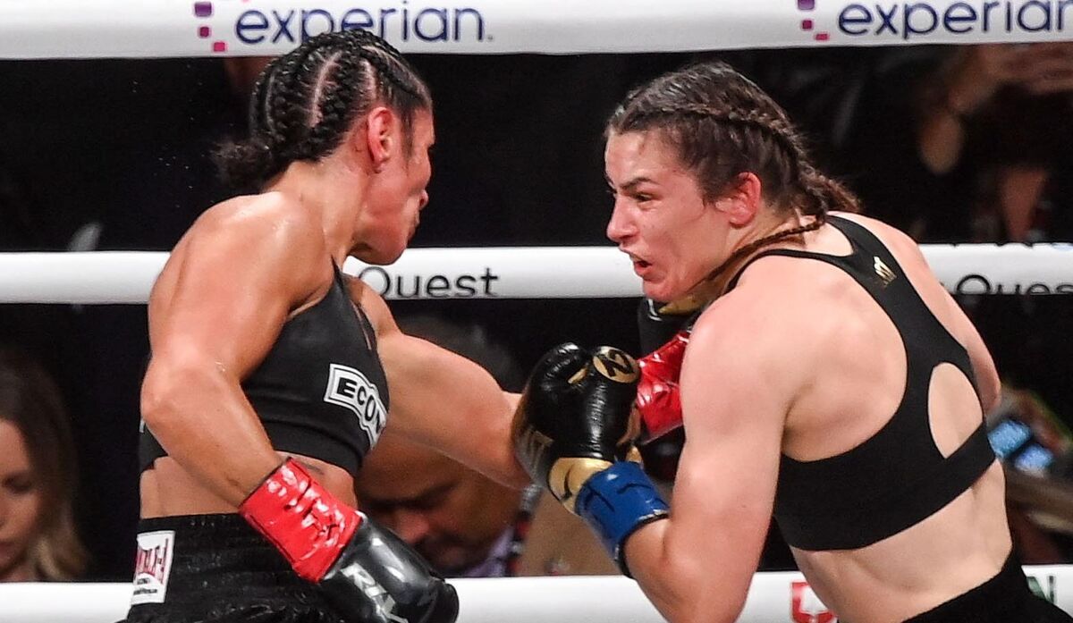 BATTLE OF WILLS: Katie Taylor, right, and Amanda Serrano during their undisputed super lightweight championship fight at AT&amp;T Stadium in Arlington, Texas, USA. Pic: Stephen McCarthy/Sportsfile