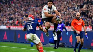 <p>All Black wing Caleb Clarke gather possession with Gabin Villiere closes in during during the Autumn Nations Series meeting at the Stade de France. Pic:  Franco Arland/Getty Images</p>