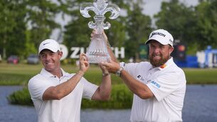 <p>Rory McIlroy and Shane Lowry hold up their trophy after winning the 2024 PGA Zurich Classic at TPC Louisiana. Picture: AP Photo/Gerald Herbert</p>