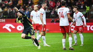 <p>HERO: Scotland's Andrew Robertson celebrates scoring his side's winning goal against Poland. Picture: Rafal Oleksiewicz/PA Wire.</p>