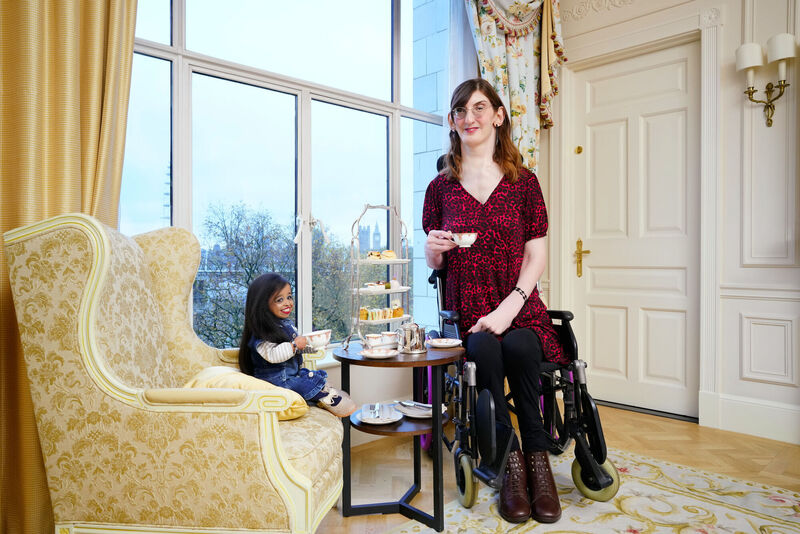Jyoti Amge, the world's shortest woman, and Rumeysa Gelgi, the world's tallest woman, meet for the first time and share afternoon tea at the Savoy Hotel, London. Picture: Michael Bowles/Guinness World Records