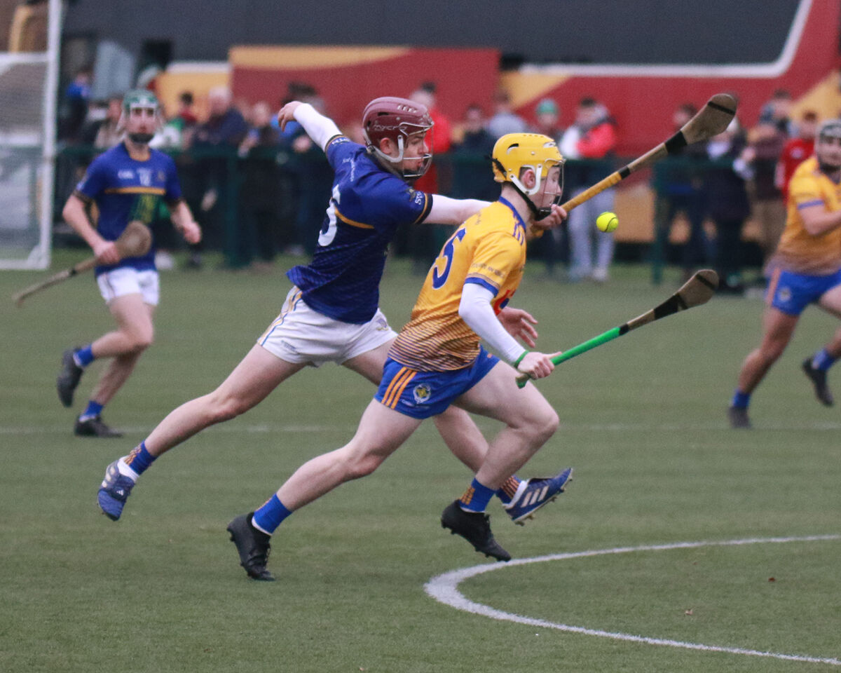 Ben O'Halloran of Rice College, Ennis on the attack against Sean McDonnell of Scoil na Trionoide Naofa, Doon. Pic: Brendan Gleeson Ben O'Halloran of Rice College, Ennis on the attack against Sean McDonnell of Scoil na Trionoide Naofa, Doon. Pic: Brendan Gleeson