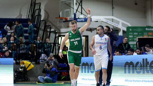 <p>BACK ON TRACK: Ireland's Sean Flood celebrates scoring three points. Picture: ©INPHO/Laszlo Geczo</p>