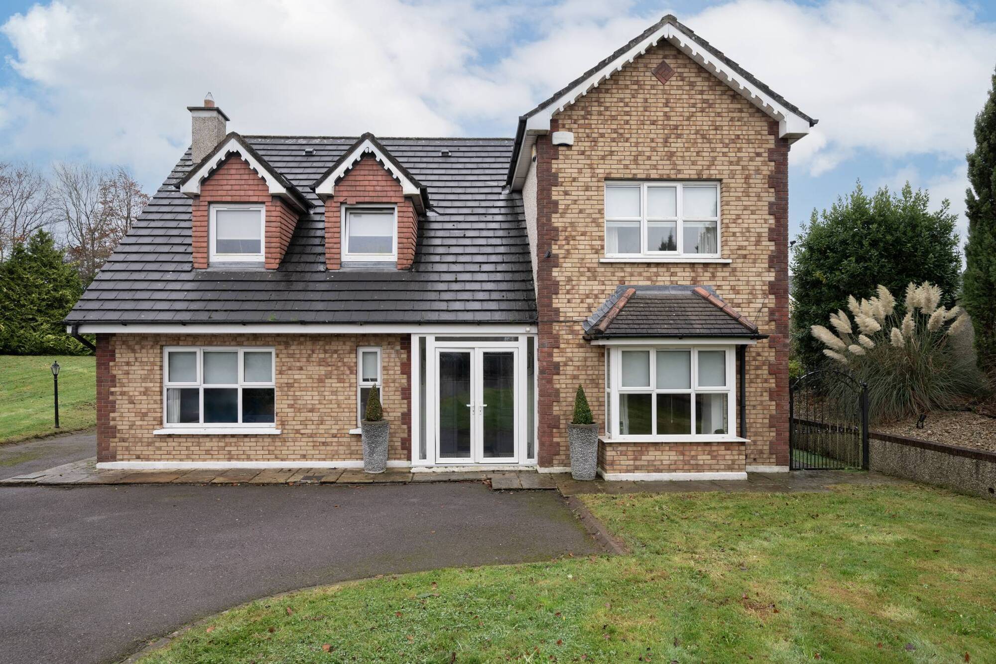 Ready-made home above major Cork Dunkathel development site on great grounds too