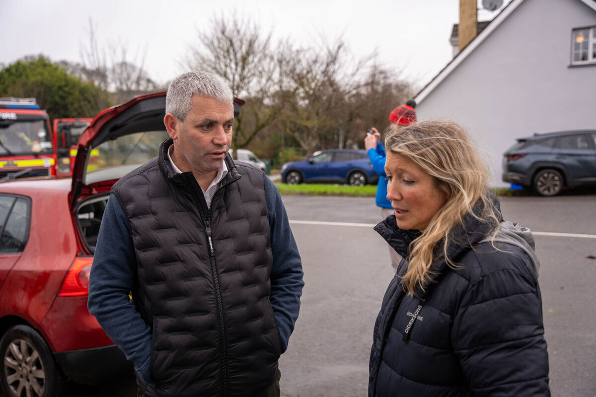 Fine Gael's Tom Lombard speaks to Rebecca Mullen, of The Flour House bakery in Riverstick, Co Cork, about relief funding available after the bakery had flooded during Storm Bert. Picture: Noel Sweeney/PA Wire