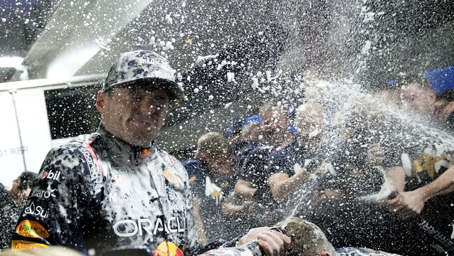 <p>Max Verstappen celebrates his fourth world title (Matt York/AP)</p>