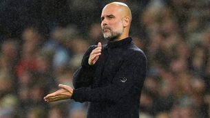 <p>Manchester City manager Pep Guardiola reacts to a missed chance. Pic: Martin Rickett/PA Wire.</p>