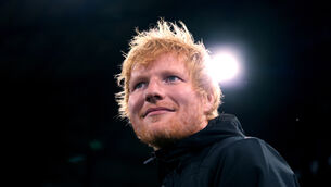 <p>Ipswich Town fan and singer-songwriter Ed Sheeran has apologised for gatecrashing a TV interview with Manchester United head coach Ruben Amorim (Bradley Collyer/PA)</p>