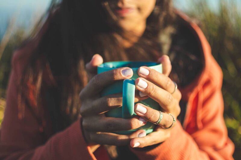 Warming up with a coffee outdoors is a definite winter perk